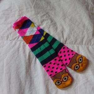 Colorful socks with owl wearing glasses at the end